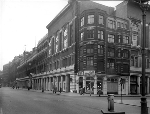 Photo:105-115 Victoria Street, including the Army and Navy Stores and the junction with Francis Street, 1954